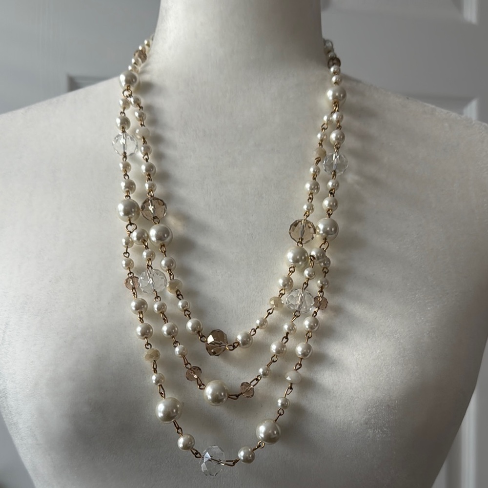 Creamy White Multi-Strand Pearl Necklace with Graduated Lengths